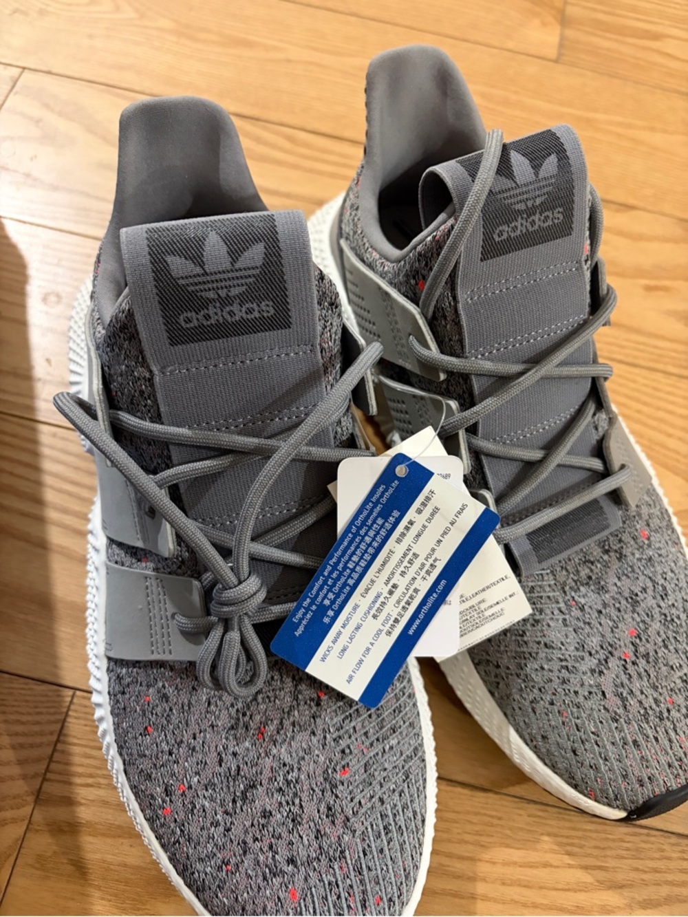 Adidas Men Gray Knit Sneakers with Subtle Red Speckles